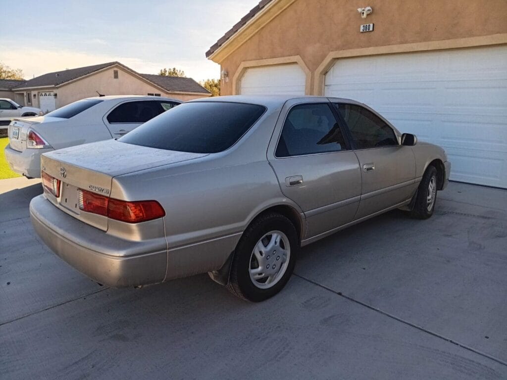 Sell Your 1999 Toyota Camry to Go Car Buyer: Instant Cash for Older Vehicles Go Car Buyer staff purchasing older 1999 Toyota Camry – sell my car fast for cash offers in Orange County.