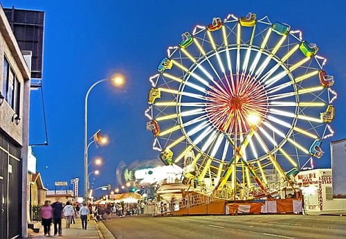 Maywood Memorial Day Street Fair in Maywood, CA, where goCarBuyer.com buys vehicles for cash in Los Angeles County.