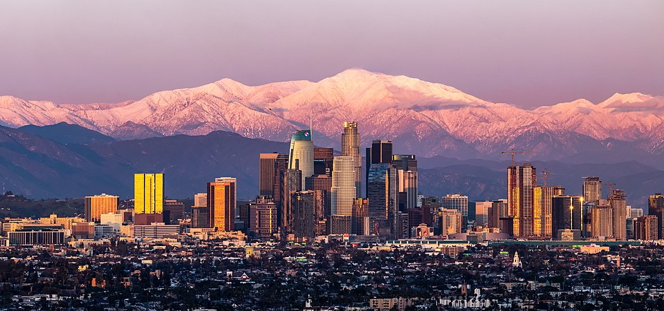 Los Angeles skyline with Mount Baldy in Los Angeles, CA, where goCarBuyer.com buys vehicles for cash in Los Angeles County.