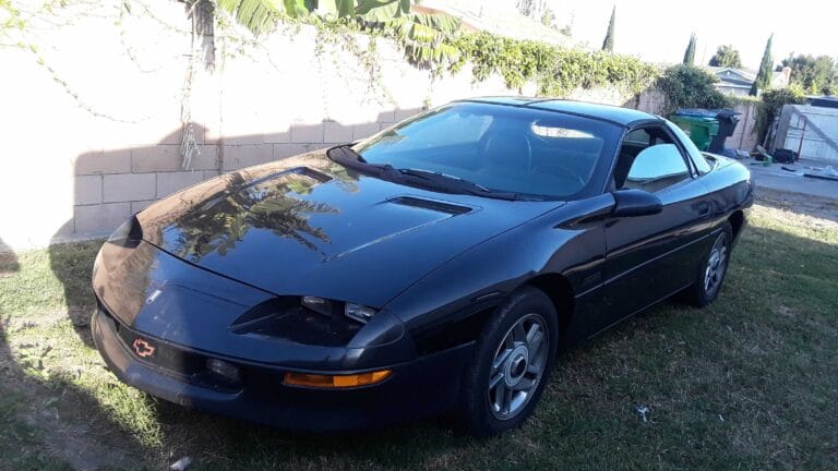 Black Chevy Camaro purchased by go car buyer we purchased all types of classic cars