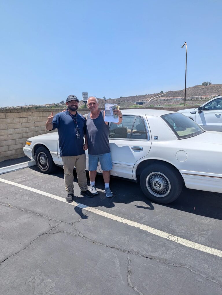 Happy customer Danny giving thumbs-up after selling his Mercury vehicle for cash to GoCarBuyer.com in Southern California
