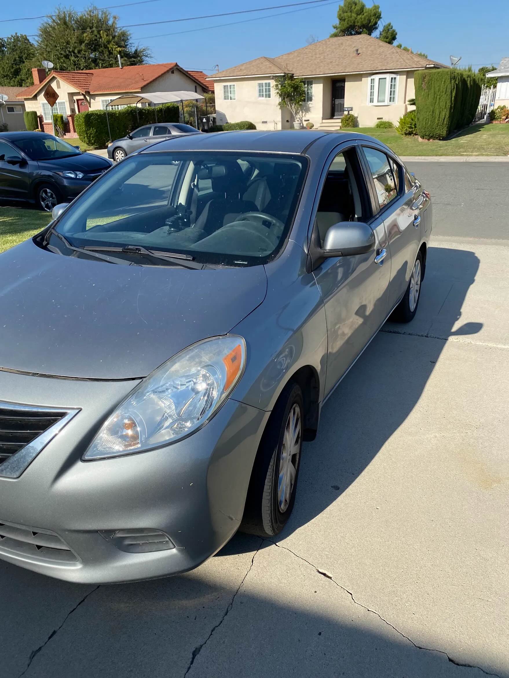 2016 Nissan Versa purchased for cash by GoCarBuyer.com from customer Douglas in Southern California