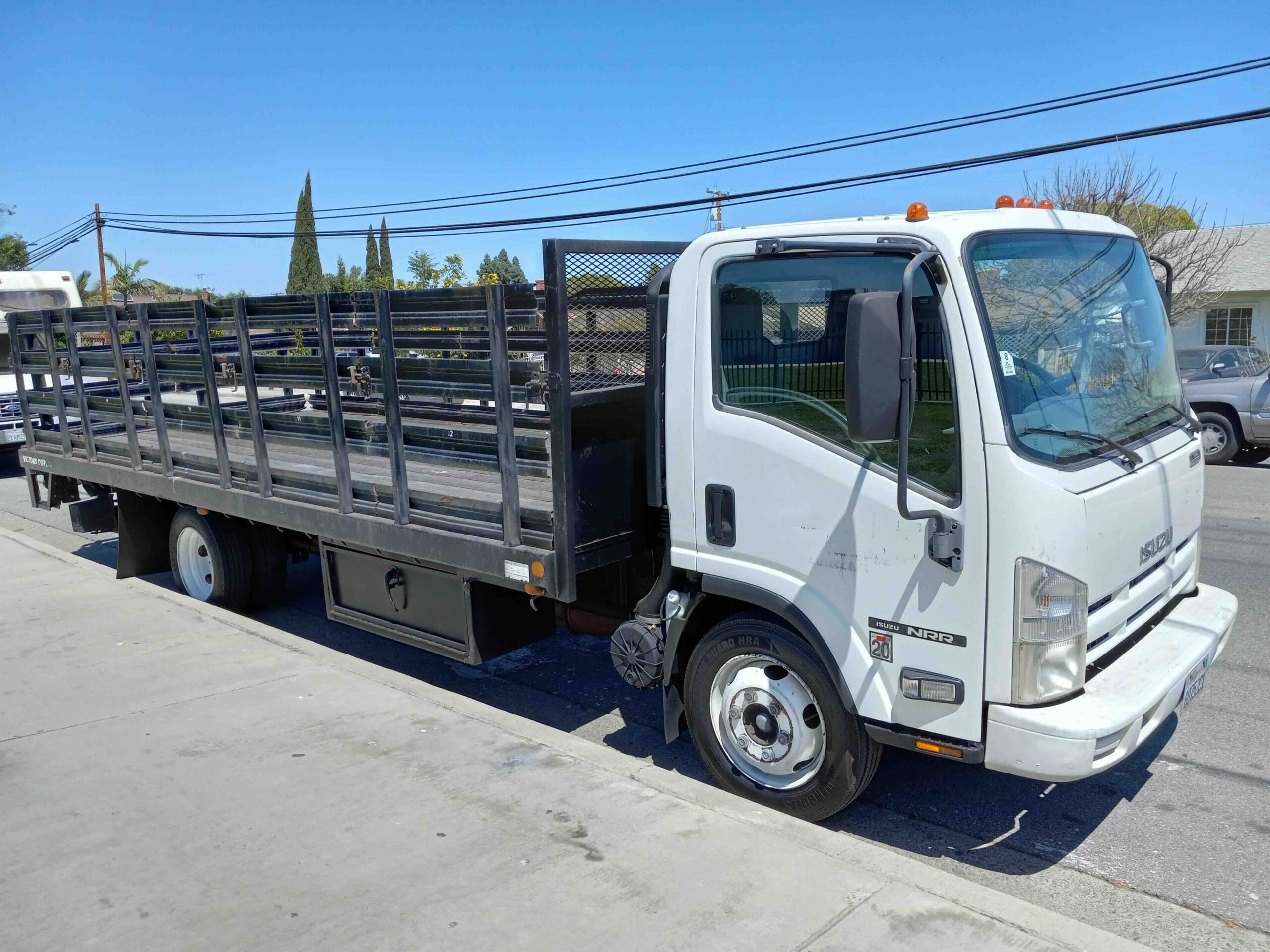 Isuzu NRR flatbed truck we bought for cash from a Southern California company fleet