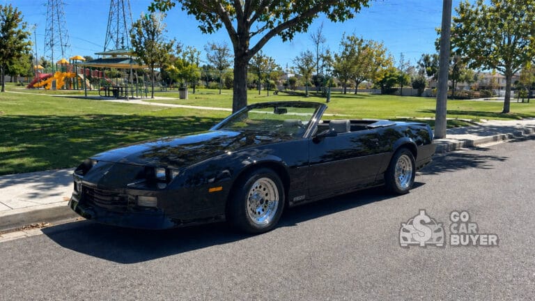 A classic black third-generation Chevrolet Camaro convertible parked in Southern California. GoCarBuyer purchases classic Camaros, project cars, and sitting vehicles directly from owners across Orange County.